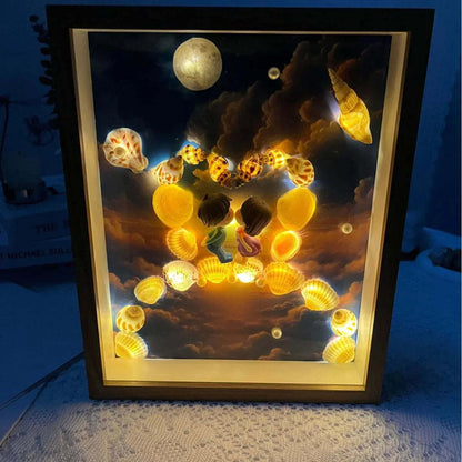 Lámpara de cielo estrellado hecha con conchas de mar