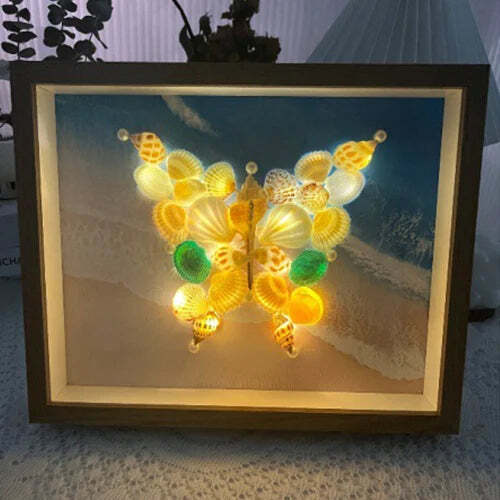 Lámpara de cielo estrellado hecha con conchas de mar